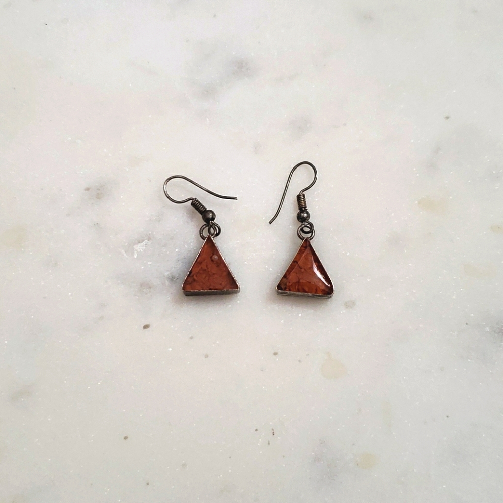 Orange triangle shaped dangling earrings
